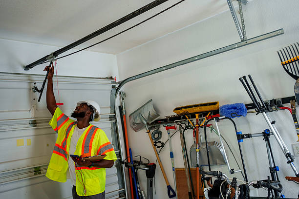Professional Garage Door Panel Replacement technician working in Nampa, ID
